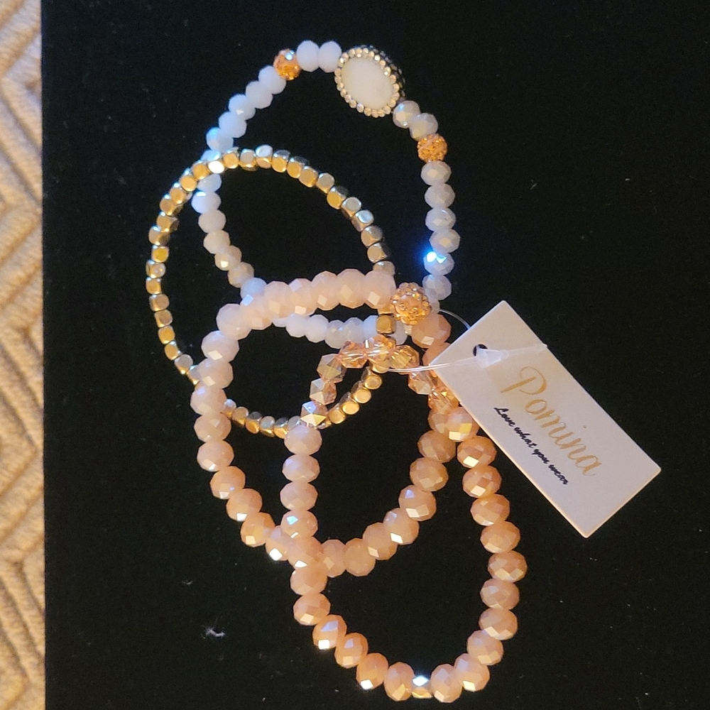 Pretty set of peach bracletes